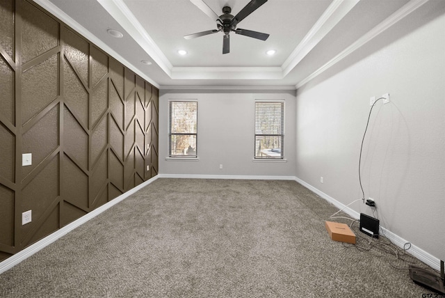 12908 County Road 463, Tyler, TX 75709 - unfurnished room featuring carpet flooring, ceiling fan, ornamental molding, and a raised ceiling