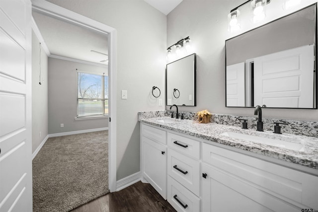 12908 County Road 463, Tyler, TX 75709 - bathroom with a sink, baseboards, and double vanity