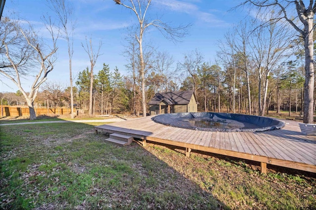 12908 County Road 463, Tyler, TX 75709 - wooden deck featuring a lawn and fence