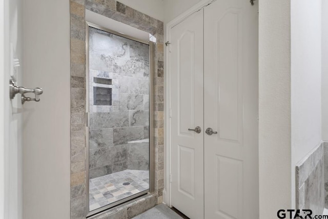 bathroom with a stall shower