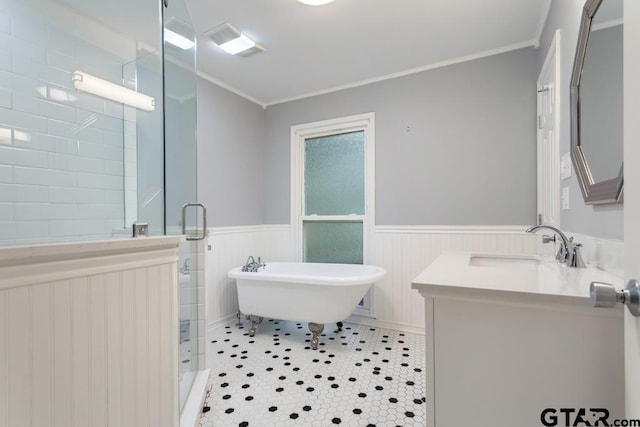 2318 S Chilton Ave, Tyler, TX 75701 - full bath featuring a stall shower, vanity, crown molding, tile patterned floors, and a freestanding tub