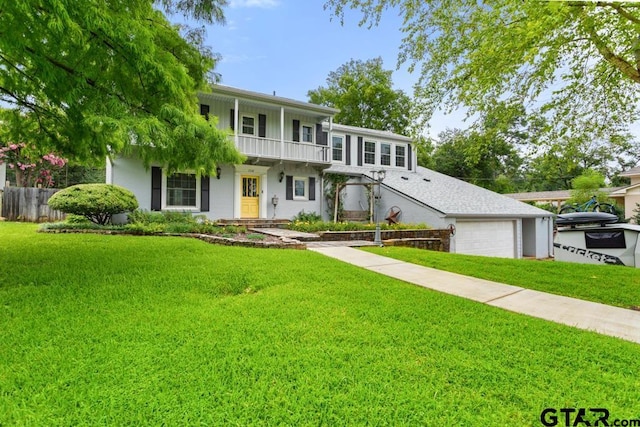2318 S Chilton Ave, Tyler, TX 75701 - view of front of home with a balcony and an attached garage