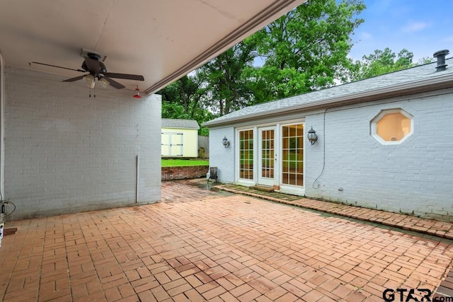 2318 S Chilton Ave, Tyler, TX 75701 - view of patio with ceiling fan and a storage unit