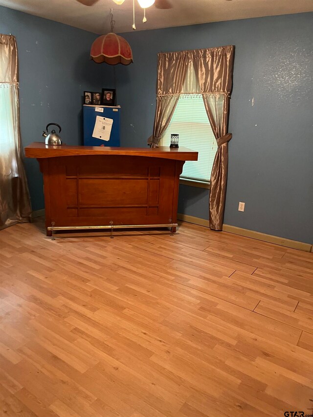 bedroom with light hardwood / wood-style flooring