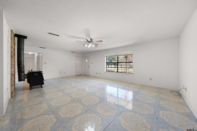 unfurnished room with ceiling fan