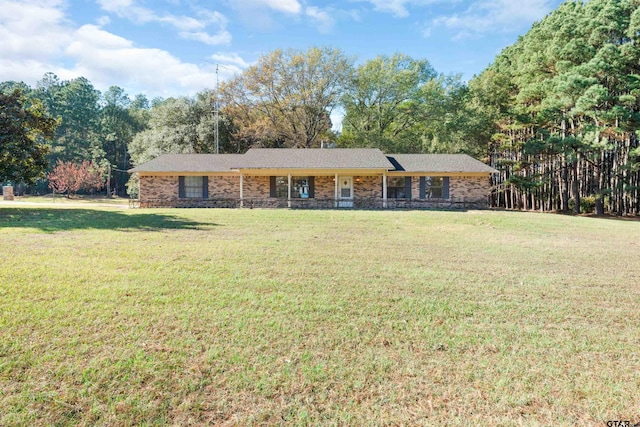 ranch-style home with a front yard