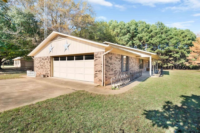 view of property exterior with a yard and a garage