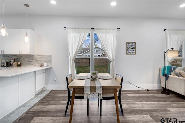 dining room featuring wood-type flooring