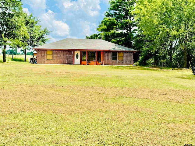 view of front of home with a front yard