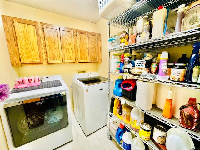 laundry room with independent washer and dryer