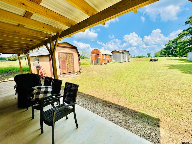 view of patio / terrace featuring a storage shed