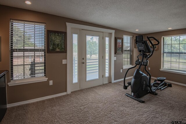 200 County Road 1520, Mount Pleasant, TX 75455 - exercise room with carpet floors, baseboards, a textured ceiling, and recessed lighting