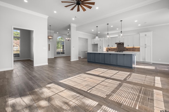 3827 Scenic Dr, Tyler, TX 75709 - kitchen with a sink, open floor plan, white cabinetry, plenty of natural light, and recessed lighting