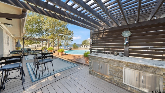 deck featuring a pergola