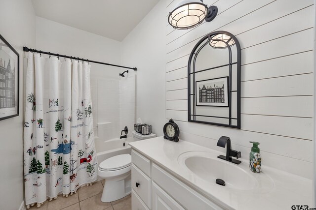 110 Carmel, Bullard, TX 75757 - full bath featuring tile patterned flooring, vanity, toilet, shower / bath combination with curtain, and wooden walls