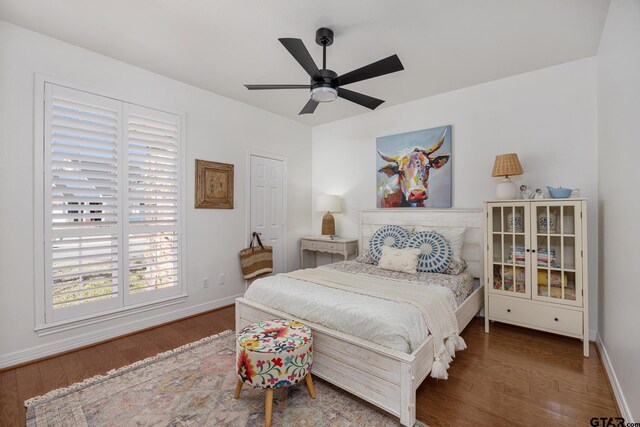 110 Carmel, Bullard, TX 75757 - bedroom featuring wood finished floors, baseboards, and ceiling fan