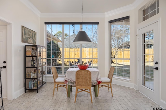 110 Carmel, Bullard, TX 75757 - dining area featuring brick flooring, baseboards, and ornamental molding