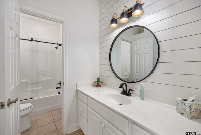110 Carmel, Bullard, TX 75757 - bathroom featuring vanity, toilet, tile patterned floors, wooden walls, and washtub / shower combination
