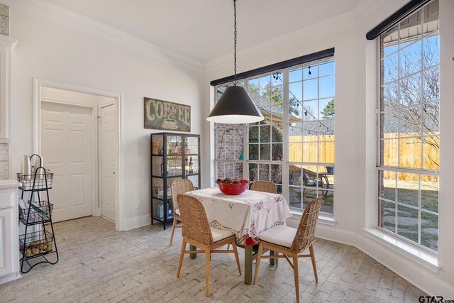 110 Carmel, Bullard, TX 75757 - dining area featuring brick flooring, crown molding, plenty of natural light, and baseboards