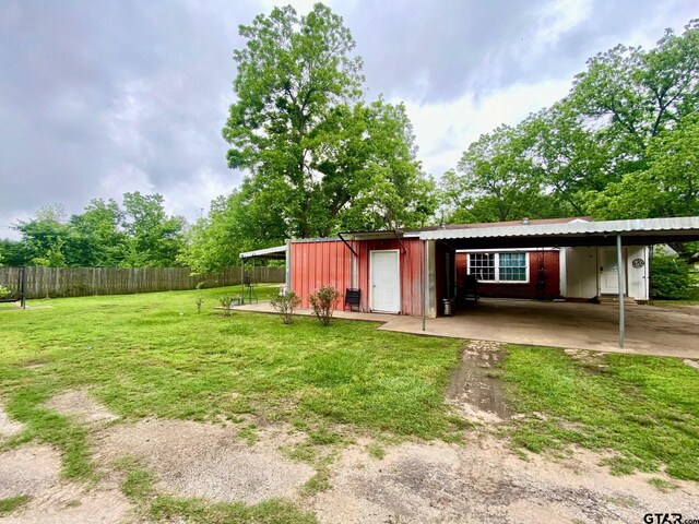 710 N 6th St, Crockett, TX 75835 - view of outbuilding featuring fence