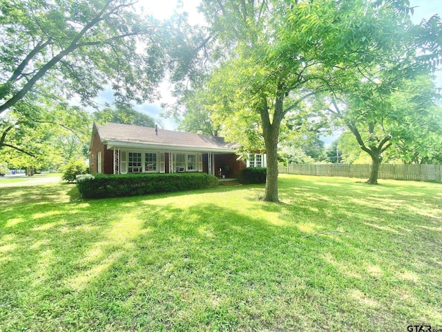 710 N 6th St, Crockett, TX 75835 - view of yard with fence