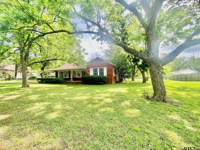 710 N 6th St, Crockett, TX 75835 - view of yard featuring fence