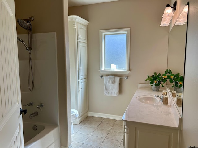 bathroom featuring baseboards, shower / bath combination, vanity, and tile patterned floors