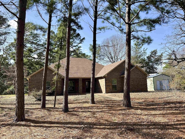 view of front facade featuring brick siding