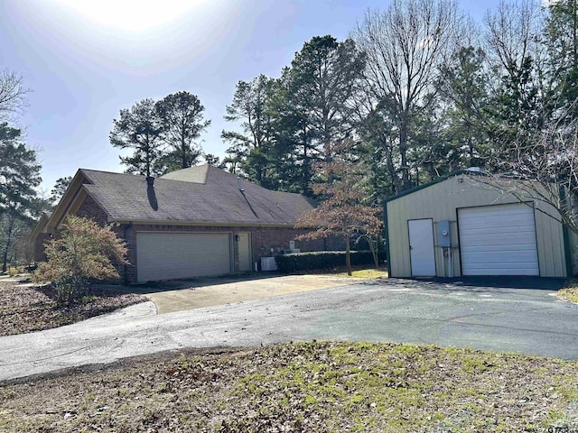 garage featuring driveway