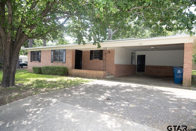 700 E Main, Whitehouse, TX 75791 - ranch-style house with brick siding, concrete driveway, and a carport