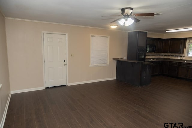 700 E Main, Whitehouse, TX 75791 - kitchen featuring black appliances, ceiling fan, dark wood finished floors, a peninsula, and ornamental molding