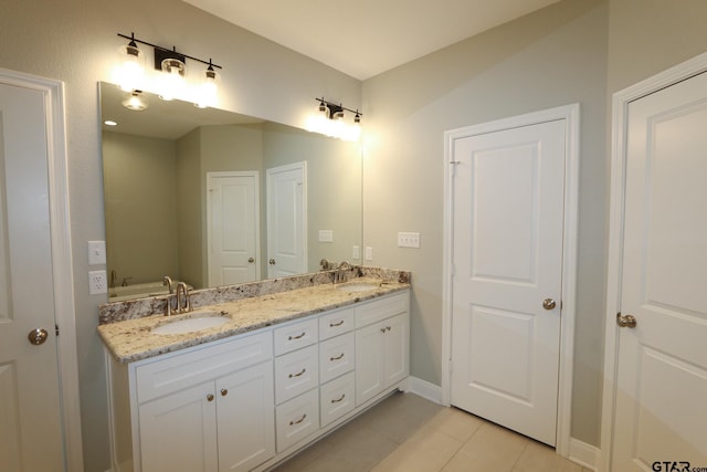 11747 Jayden Ln, Tyler, TX 75703 - full bath with double vanity and tile patterned flooring
