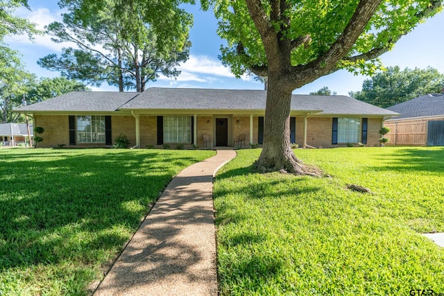 902 Joel Dr, Tyler, TX 75703 - single story home with brick siding and a shingled roof