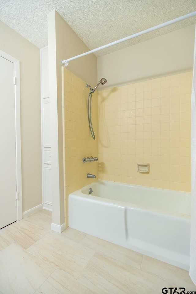 902 Joel Dr, Tyler, TX 75703 - full bathroom with shower / bath combination and a textured ceiling