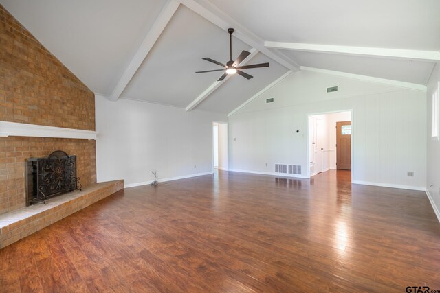 902 Joel Dr, Tyler, TX 75703 - unfurnished living room with ceiling fan, wood finished floors, a fireplace, and baseboards