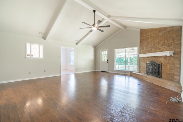 902 Joel Dr, Tyler, TX 75703 - unfurnished living room with a fireplace, high vaulted ceiling, beam ceiling, a ceiling fan, and wood finished floors
