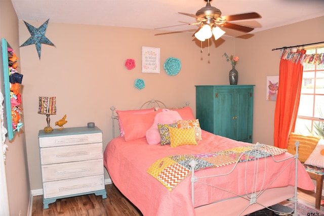 607 Brookhollow Dr, Palestine, TX 75801 - bedroom with wood finished floors and ceiling fan