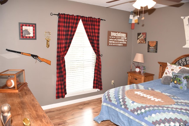 607 Brookhollow Dr, Palestine, TX 75801 - bedroom featuring wood finished floors, baseboards, and ceiling fan
