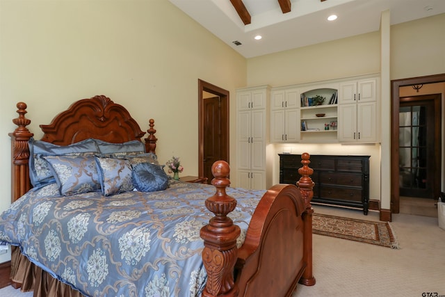 bedroom featuring light colored carpet, beamed ceiling, ceiling fan, and a high ceiling