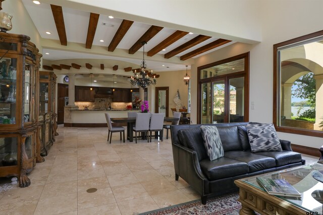 living room featuring french doors, beamed ceiling, a chandelier, and light tile patterned flooring