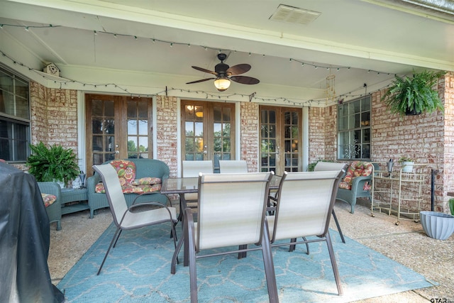 view of patio / terrace with ceiling fan and french doors