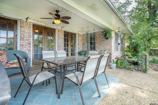 view of patio featuring ceiling fan and french doors