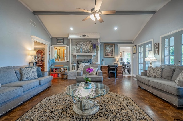 living room with a fireplace, ornamental molding, dark parquet floors, and vaulted ceiling