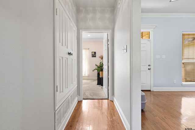 5201 Whitaker Cir, Longview, TX 75605 - hall featuring wood finished floors and ornamental molding