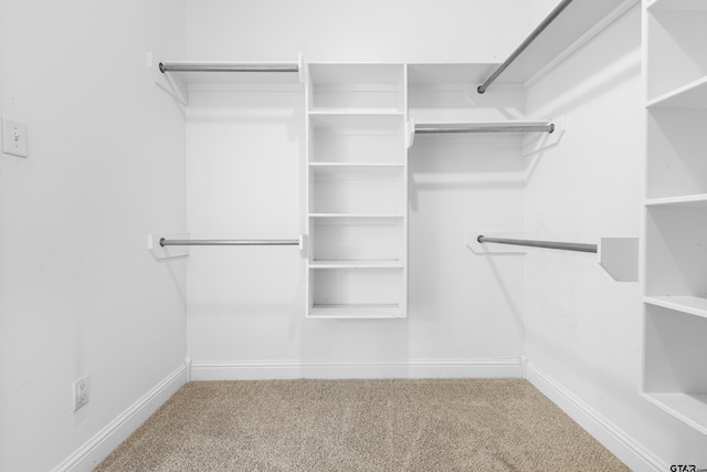 5201 Whitaker Cir, Longview, TX 75605 - walk in closet with carpet flooring