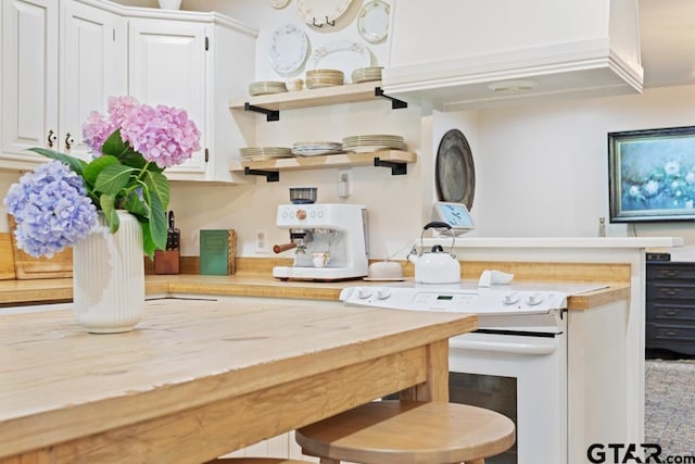 kitchen featuring white cabinetry