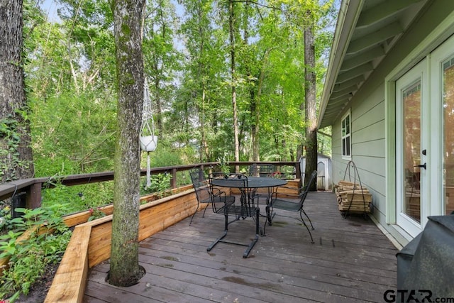 1435 W Hideaway Ln, Hideaway, TX 75771 - wooden terrace with outdoor dining space