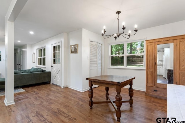 1435 W Hideaway Ln, Hideaway, TX 75771 - dining room with a chandelier, wood finished floors, baseboards, and recessed lighting