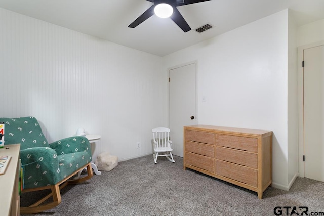 sitting room with light carpet and ceiling fan