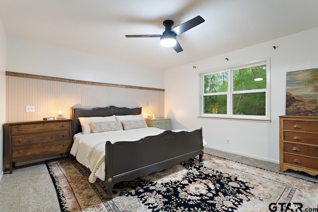 1435 W Hideaway Ln, Hideaway, TX 75771 - bedroom with carpet floors, baseboards, and a ceiling fan